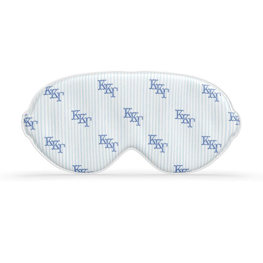 Sleep mask with blue ΚΚΓ pattern on a white background