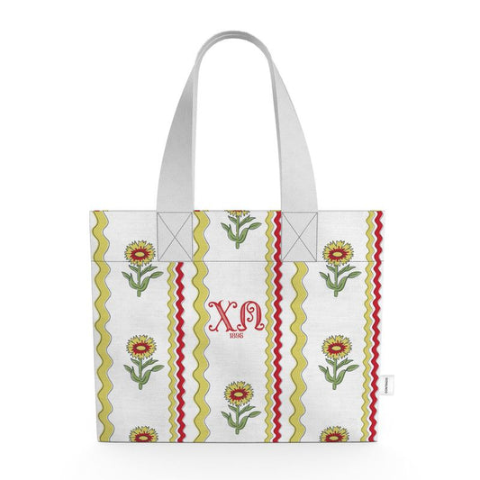 Tote bag with floral design and ΧΩ letters on a white background