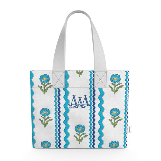 Tote bag with floral design and blue stripes on a white background