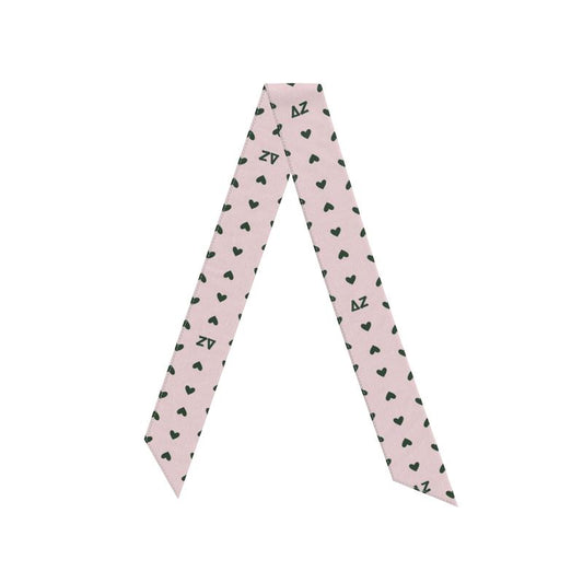 Pink twilly scarf with green heart patterns and Delta Zeta letters on a pink background