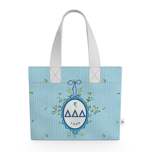 Tote bag with a blue design featuring a logo and text on a white background